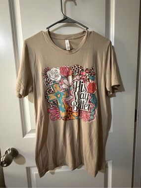 Bella Canvas Tan Graphic Tee with Multicolor Cross and Floral Design
